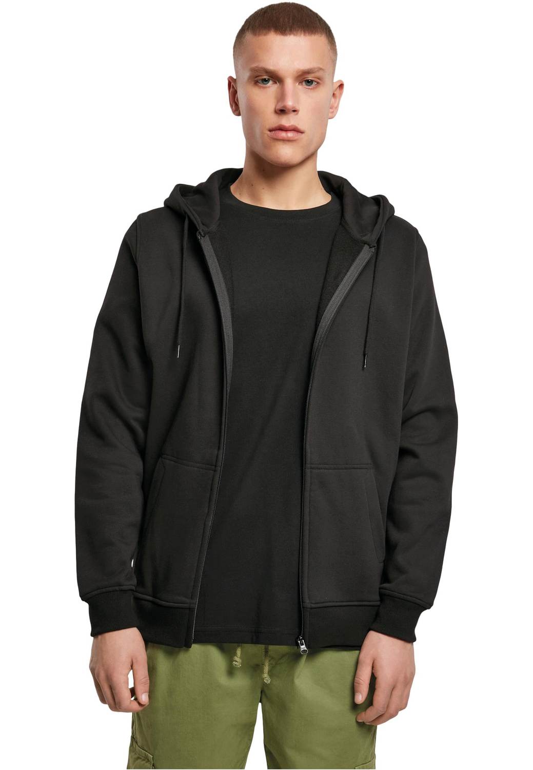 Build Your Brand BY012 hoodie met rits gedragen door model, zwart